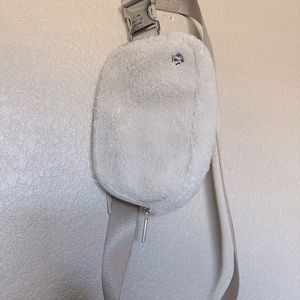 lululemon bumbag , cream fur.